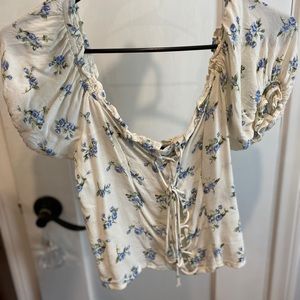 White shirt with blue flowers